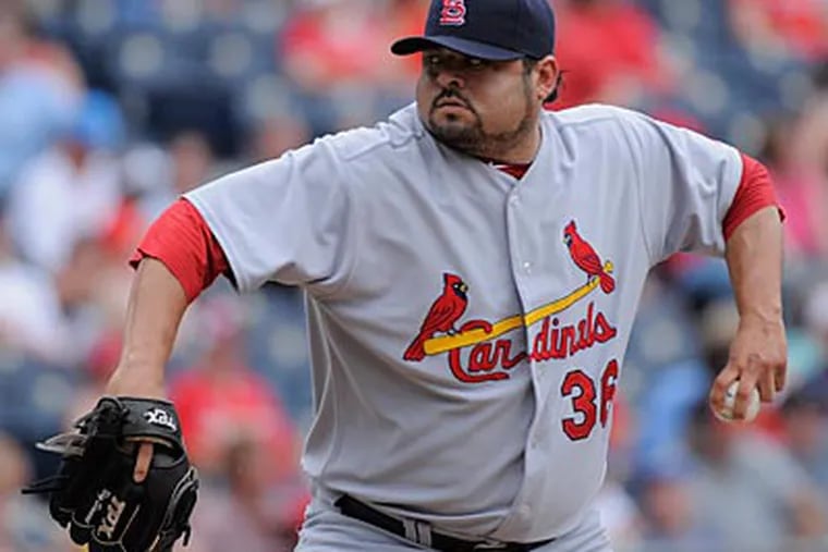 The Phillies have signed LHP Dennys Reyes. (AP Photo/Reed Hoffmann)