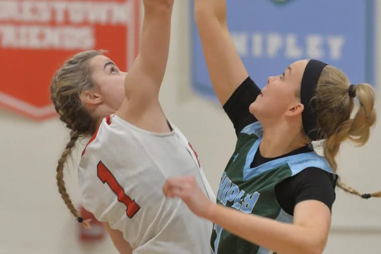 #1 Elle Stauffer of Germantown Academy fights for the opening jump against #11 Anna Camden of The Shipley School.Girls Basketball game between Shipley and Germantown Academy played At the Westtown School in West Chester, Pa  Shipley was victorious . November, 23rd 2018 (Bob Williams /For the Inquirer)
