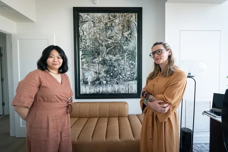 Eileen Teng (left) commissioned a painting by New York artist Antoinette Wysocki (right). Wysocki used charcoal, gouache, and graphite to create the piece inspired by Morris Arboretum.