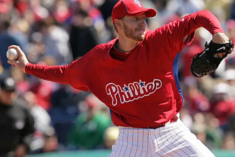 Phillies pitchers Roy Halladay (above) and Cole Hamels could be one of the best one-two punches in baseball. (Yong Kim / Staff Photographer)