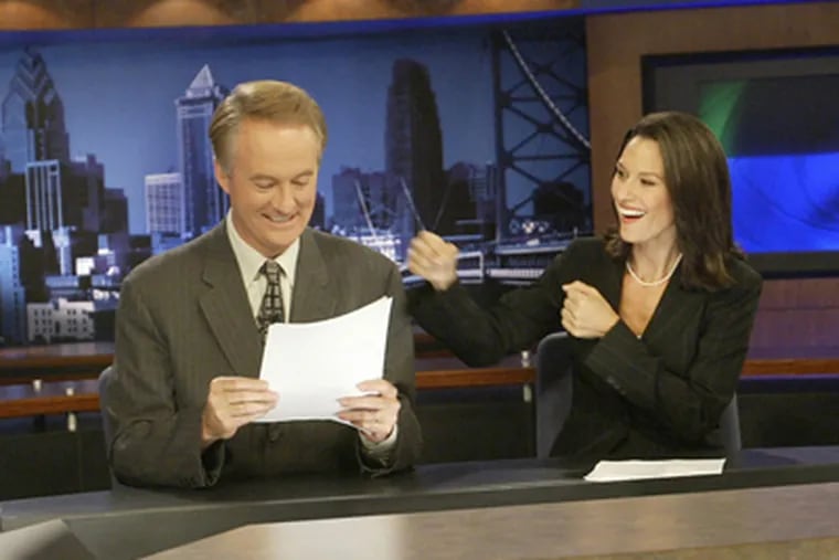 Larry Mendte and Alycia Lane joke around on the set in 2003. (Staff File Photo)