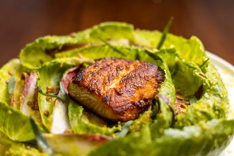The Endive & baby gem salad with tarragon vinaigrette and salmon at Vernick Fish in Philadelphia, Pa., on Thursday, Feb. 8, 2024.