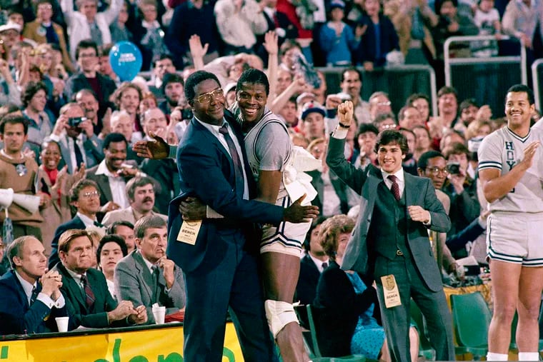 John Thompson and tournament MVP Patrick Ewing celebrate Georgetown's national title in 1984.