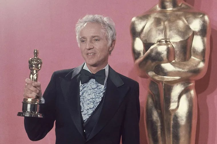 Haskell Wexler holds the Oscar he won in 1977 for "Bound for Glory," a biopic on Woody Guthrie.