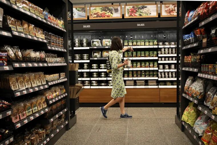 Irena Kubiliene shops at the new Amazon Go store on the 100 block of South Franklin Street in Chicago.