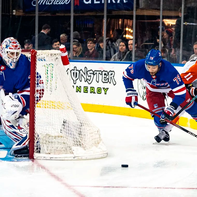 Travis Konecny (right) notched a goal and assist in a 6-5 loss to the Rangers on Tuesday night.