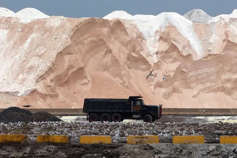 Road salt is piled high at the International Salt Co. facility at the former U.S. Steel plant in Fairless Hills. The company also refines salt for fabric softeners at the Lower Bucks facility.