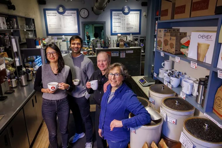 Amy Zhou and Mittul Patel (left) at Old City Coffee's Old City location with previous owners Jack Treatman and Ruth Isaac.