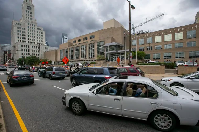 Traffic in front of the School District of Philadelphia headquarters is heavy because of families trying to pick up laptops. The School District is handing out Chromebooks at the school administration building on Tuesday, Sept. 1, 2020, in preparation for the start of virtual classes.