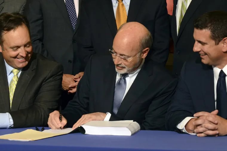 Gov. Wolf (center) with  Senate Majority Leader Jake Corman (right) and House Majority Leader Dave Reed.