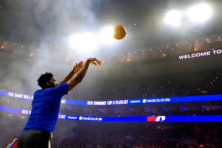 Joel Embiid of the Sixers warms up as smoke machines churn away inside before their NBA Eastern Conference Semifinal Playoff Game at the Wells Fargo Center on May 9, 2019.