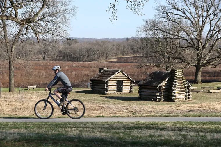 Valley Forge National Park conducted a controlled burn yesterday people today bike past the burned meadows and huts, Wednesday,  April 3, 2019. In recent years these meadows have been overtaken by exotic invasive plants which degrade the habitat and cannot be adequately controlled by mowing or herbicide.