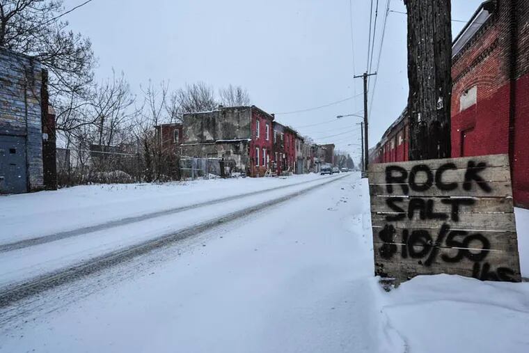 Rock salt for sale at 8th and Dauphin streets in Philadelphia on Feb. 21, 2015. (Jessie Fox / Philly.com)