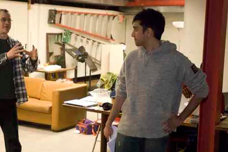 Director David Bradley (left) instructs Ankit Dogra during a rehearsal of &quot;Milk and Honey.&quot;