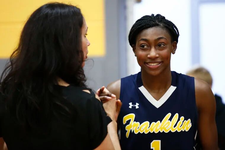 Diamond Miller (right) helped lead Franklin to an undefeated season.