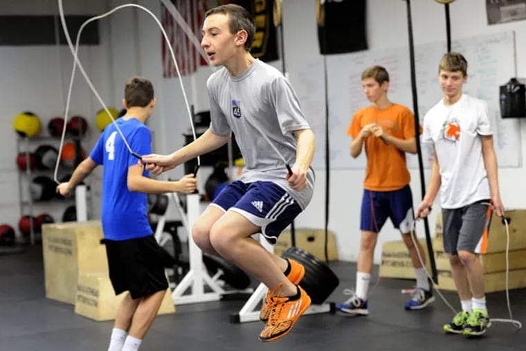 Robert Reed, 15, warms up with a jump rope before a CrossFit class for teens in Loyalhanna, Pa. (John Heller/Pittsburgh Post-Gazette/TNS)