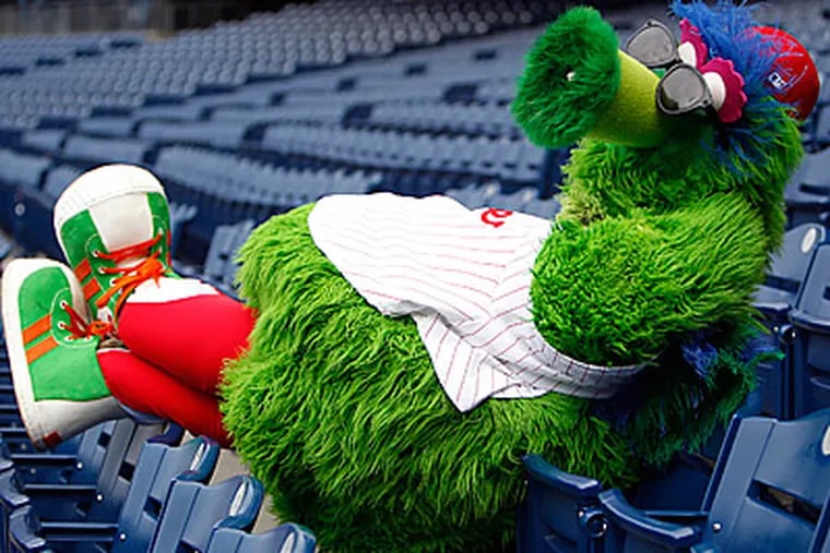The Phillie Phanatic relaxes in the stands at Citizens Bank Park. (David Maialetti/Staff Photographer)