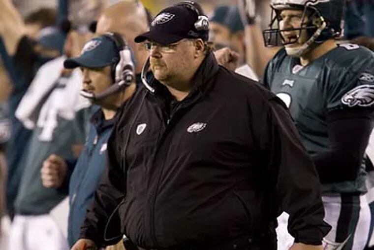 "You have great passion in Philadelphia," Eagles coach Andy Reid said after his team routed the Cowboys, 44-6, to clinch a playoff berth. (Ed Hille / Staff Photographer)