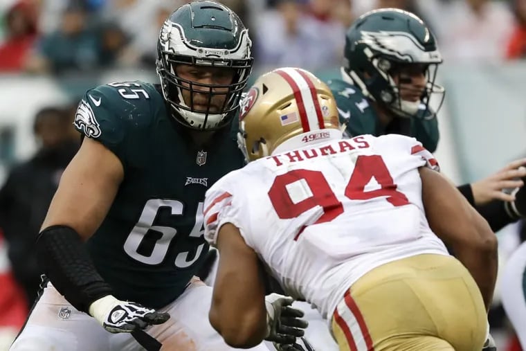 Offensive tackle Lane Johnson watches San Francisco 49ers defensive end Solomon Thomas in Sunday’s Eagles victory.