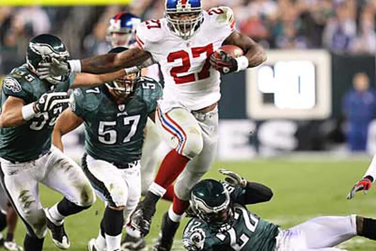Giants running back Brandon Jacobs ran for 126 yards and two touchdowns against the Eagles. (Steven M. Falk / Staff Photographer)