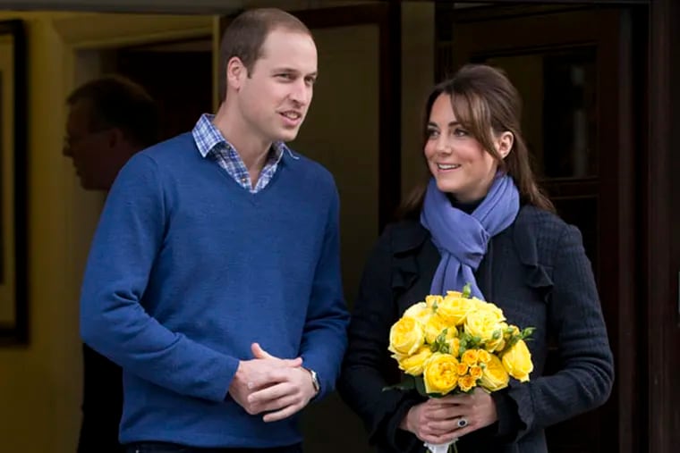 Britain's Prince William stands next to his wife Kate, Duchess of Cambridge as she leaves the King Edward VII hospital in central London, Thursday, Dec. 6, 2012. Prince William and his wife Kate are expecting their first child, and the Duchess of Cambridge has been admitted to hospital suffering from a severe form of morning sickness in the early stages of her pregnancy.  (AP Photo/Alastair Grant)