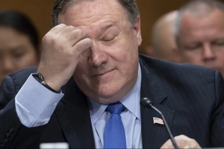 Secretary of State Mike Pompeo pauses as he testifies before the Senate Foreign Relations Committee as lawmakers demand specifics from him on President Donald Trump's meeting with Russian leader Vladimir Putin in Helsinki last week, on Capitol Hill in Washington, Wednesday, July 25, 2018. Pompeo says he has personally told top Russian officials that there will be "severe consequences" for any interference in U.S. elections or the American democratic process. (AP Photo/J. Scott Applewhite)
