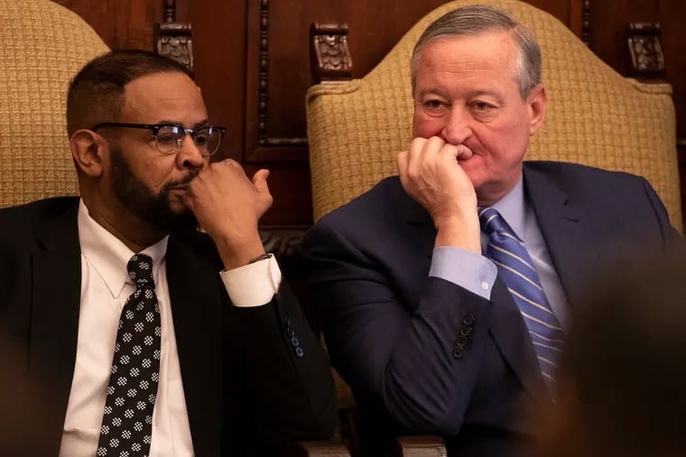 Mayor Jim Kenney (right) sits next to Philadelphia City Councilman Curtis Jones in 2019. They differ on a bill to restrict medical marijuana dispensaries from adding recreational weed if it becomes legal.