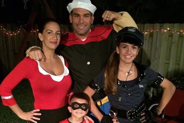 Frank Donatucci with wife, Betsy, and children, Brianna and Frankie, at Halloween.