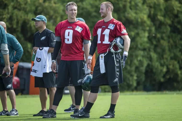 Philadelphia Eagles’ quarterbacks Nick Foles and Carson Wentz, right, on the first day of training camp, Monday, July 24, 2017.