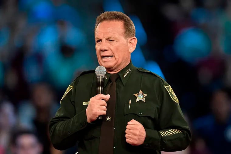FILE - This Feb. 21, 2018, file photo shows Broward County Sheriff Scott Israel speaking before a CNN town hall broadcast, at the BB&T Center, in Sunrise, Fla. New Florida Gov. Ron DeSantis suspended Israel on Friday, Jan. 11, 2019, over his handling of February’s massacre at Marjory Stoneman Douglas High School.(Michael Laughlin/South Florida Sun-Sentinel via AP, File)