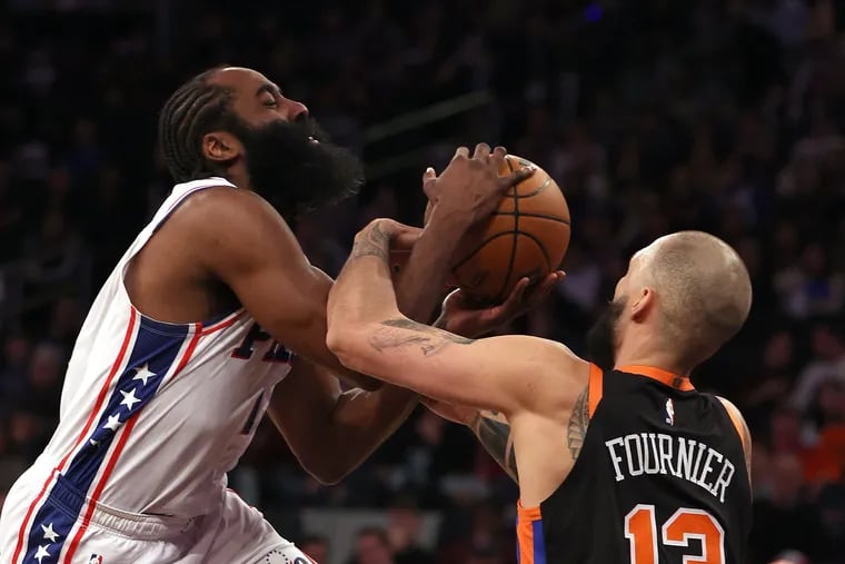 James Harden (1) of the Philadelphia 76ers heads for the net as Evan Fournier (13) of the New York Knicks defends in the first half at Madison Square Garden on Feb. 05, 2023, in New York City. (Elsa/Getty Images/TNS)