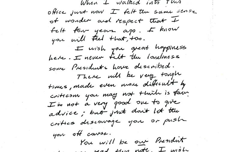 This image provided by the George H.W. Bush Presidential Library and Museum shows a note written by George H.W. Bush to Bill Clinton.   (George H.W. Bush Presidential Library and Museum via AP)