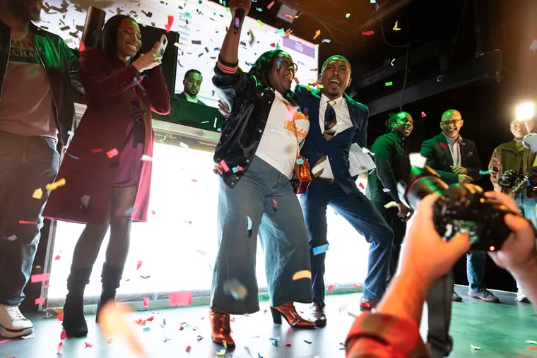 City Council candidates Kendra Brooks and Nicolas O'Rourke celebrate after the Working Families Party declared victory at their election night gathering at Roar Nightclub in Philadelphia on Tuesday night.