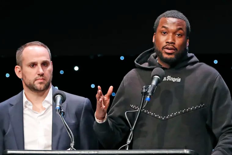 In this Jan. 23, 2019, file photo, musician Meek Mill, right, speaks about his incarceration along with Philadelphia 76ers co-owner Michael Rubin at the launch of REFORM Alliance in New York.