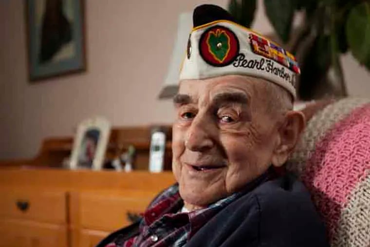 George Frazier, 91, Pearl Harbor survivor, in his granddaughter's home in  Warminster, Bucks County. Frazier was serving in the Army and was wounded in the attack. He reenlisted in the Navy and finished the war as a seabee. (ED HILLE / Staff Photographer )
