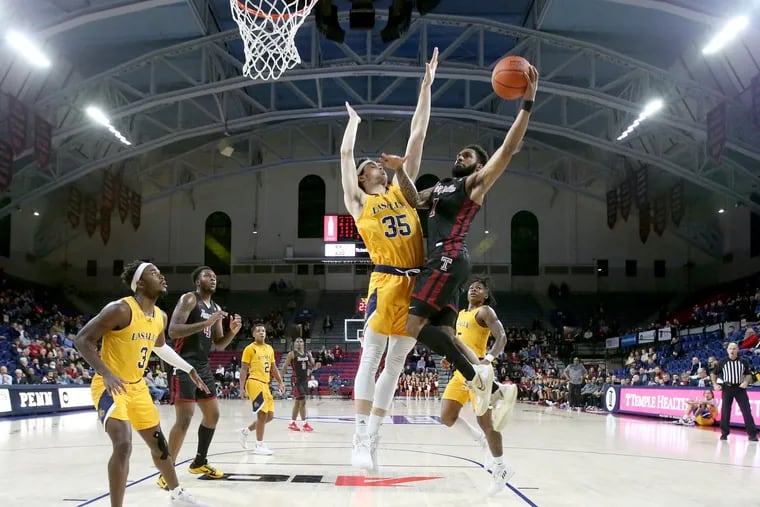 Damian Dunn of Temple goes up for a shot against Rokas Jocius of La Salle during the first half of their game at The Palestra on Nov. 30, 2022.