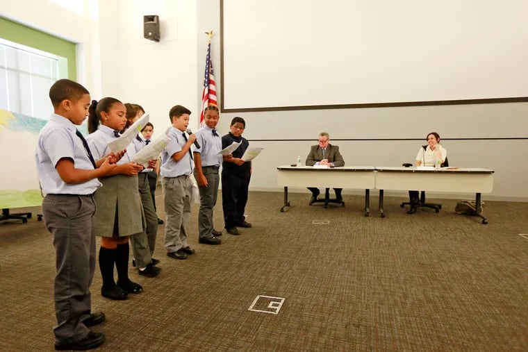 Students from Julia De Burgos Elementary give a presentation to mayoral candidates Jim Kenney and Melissa Murray Bailey on Tuesday, Oct. 20, 2015.