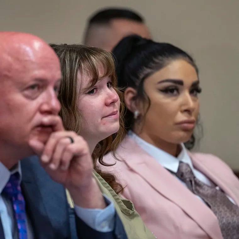 Hannah Gutierrez Reed, center, with her attorney Jason Bowles and paralegal Carmella Sisneros during her sentencing hearing in state district court in Santa Fe, New Mexico, on Monday.