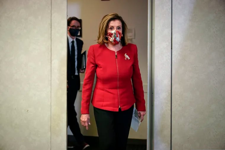 Speaker of the House Nancy Pelosi, D-Calif., arrives to talk to reporters about Election Day results in races for the House of Representatives, at Democratic National Committee headquarters in Washington, Tuesday, Nov. 3, 2020.