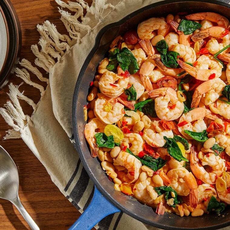 Shrimp With White Beans, Garlic and Calabrian Chile. MUST CREDIT: Tom McCorkle for The Washington Post