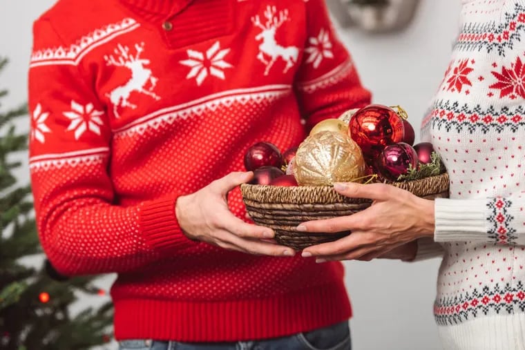 Normal holiday sweaters, which cover all parts of the torso. Unlike the “reindeer boob sweater.”