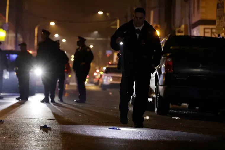 Police arrive at the 1600 block of Cecil B. Moore Avenue in North Philadelphia, where five people were shot shortly after 1 a.m. Saturday. One, a 16-year-old male, was pronounced dead at Temple University Hospital a short time later.