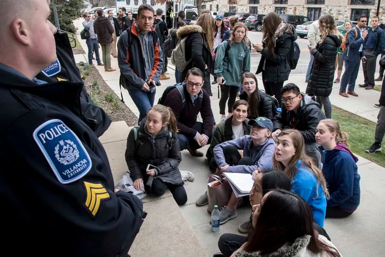 Students gather outside the Garey Hall auditorium on the campus of Villanova University to hear social scientist Charles Murray speak Thursday, March 30, 2017. Public safety officers removed at least three protesters from the lecture. Murray has been accused of being a white nationalist over his writings about race, economic status, and intelligence.