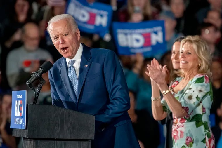 Democratic presidential candidate former Vice President Joe Biden is on stage with his wife Jill Biden and daughter Ashley during his primary night election rally in Columbia, S.C. Feb. 29, 2020, after winning the South Carolina primary.