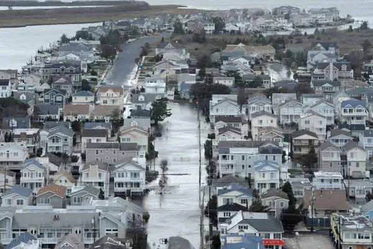 Portions of Ocean City, NJ still have flooded streets. ( CLEM MURRAY / Staff Photographer )