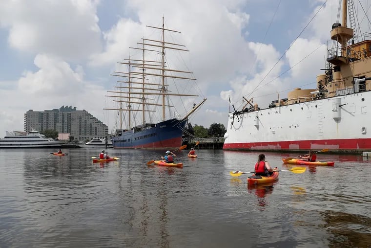 A group paddles out of the marina during the Independence Seaport Museum’s kayaking eco tour on the Delaware River in Philadelphia in 2019.