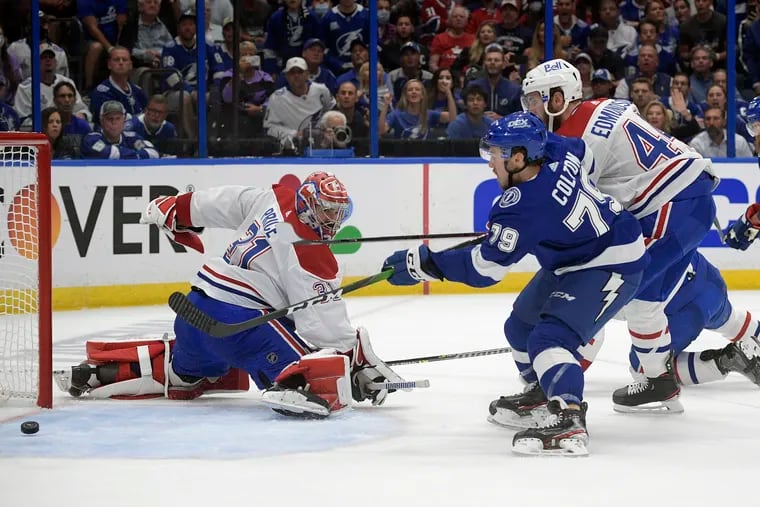 Tampa Bay's Ross Colton (79) slides the puck past Montreal's Carey Price for the only goal of the game Wednesday as the Lightning beat the Canadiens to win their second consecutive Stanley Cup.
