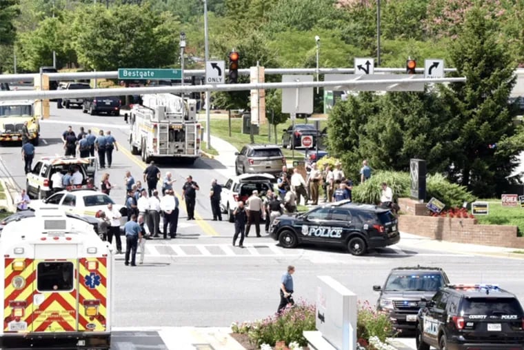 Police respond to a shooting reported at Capital Gazette newspaper in Annapolis, Mdaryland.