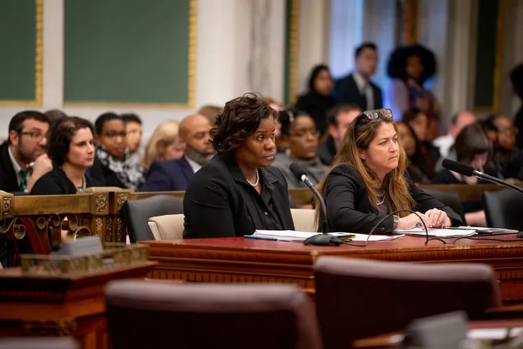 Philadelphia Department of Human Services Commissioner Kimberly Ali (front left), then a deputy commissioner with DHS, and Cynthia Figueroa (front right), now the Deputy Mayor of the city's Office of Children and Families, speaks during a City Council hearing unrelated to Devereux Advanced Behavioral Health in February 2019.