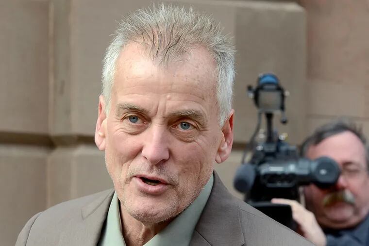 Former sportscaster Don Tollefson meets with reporters to explain his turn-around decision to fight the fraud charges in North Philly December 22, 2014. ( TOM GRALISH / Staff Photographer )